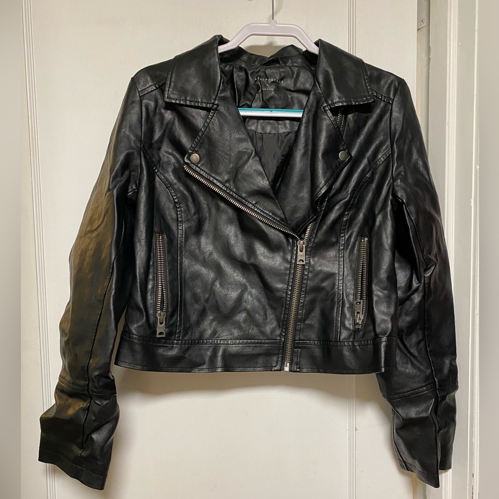 Large black leather jacket. Like new. *faux